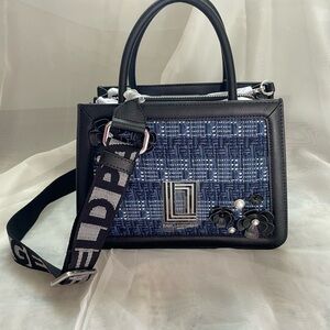 Karl Lagerfeld Paris Simone top handle crossbody bag with a logo strap